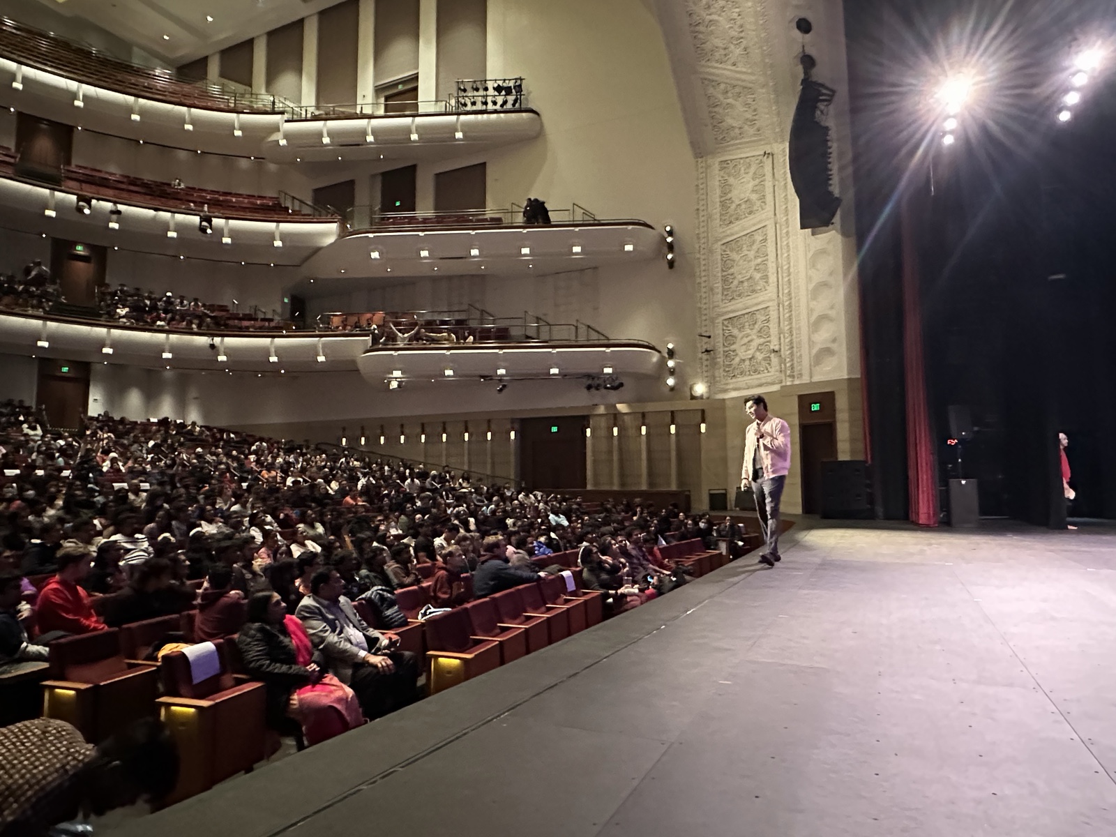 A packed theater at a major community gathering